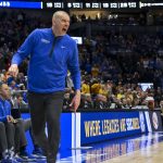 Mark Pope coaches Kentucky during the SEC Tournament.