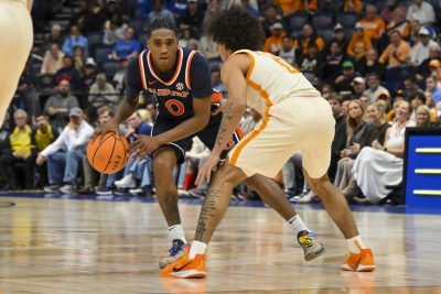 Ja’Kobi Gillespie guards Auburn Tigers guard Tahaad Pettiford.