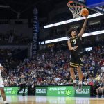 Tyler Tanner lays the ball in against the Florida Gators.