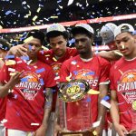 Arkansas players celebrate their SEC Tournament title.