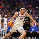 Viktor Mikic drives past Prairie View A&M Panthers forward Cory Wells