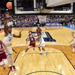 Kentucky Wildcats forward Brandon Garrison and Santa Clara Broncos guard Sash Gavalyugov battle for a rebound.