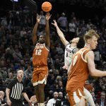 Texas Longhorns guard Tramon Mark shoots against Gonzaga Bulldogs guard Jalen Warley.