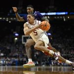 Mar 21, 2026; Portland, OR, USA; Arkansas Darius Acuff Jr. drives against High Point Panthers forward Cam'ron Fletcher.