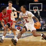 Alabama Crimson Tide guard Labaron Philon dribbles the ball against Texas Tech Red Raiders guard Jaylen Petty.