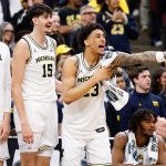 Michigan players celebrate.