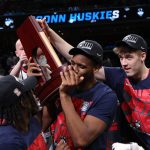 UConn players celebrate a regional title.
