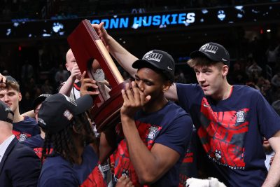 UConn players celebrate a regional title.