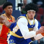 Tyran Stokes plays basketball.