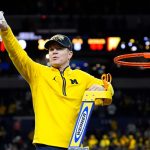 Michigan coach Dusty May.