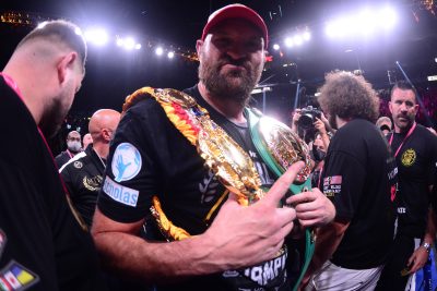 Best Tyson Fury DFS Props. Tyson Fury with championship belts.