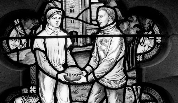 Sewanee football depicted in a stained glass window.