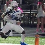 Eric McFarland scores a touchdown.