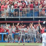 Oklahoma baseball players celebrate.