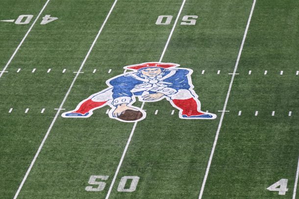 New England's throwback logo is displayed on the field.