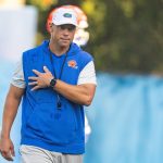 Jon Sumrall coaches Florida practice.