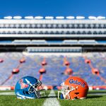 Ole Miss and Florida helmets shown on the field.