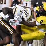 Western Michigan against Michigan.