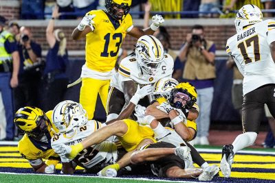 JJ Buchanan catches a Michigan touchdown.