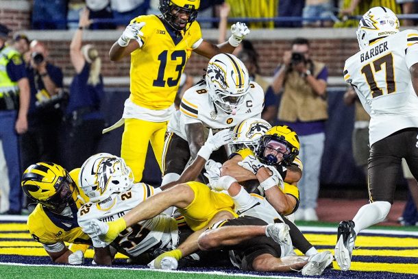 JJ Buchanan catches a Michigan touchdown.