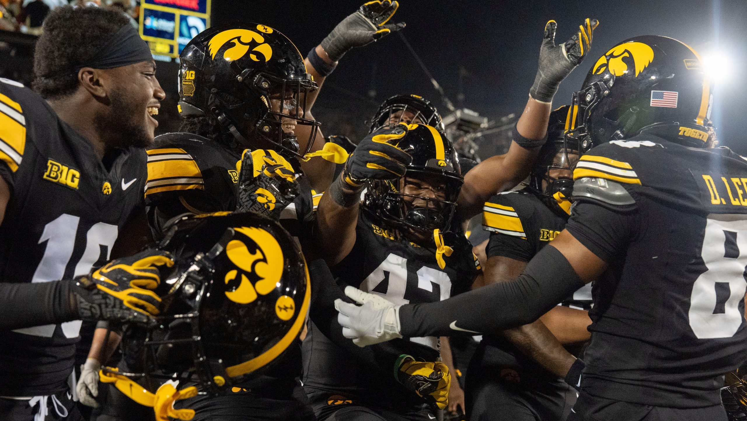 Iowa players drop Cy-Hawk trophy after beating Iowa State
