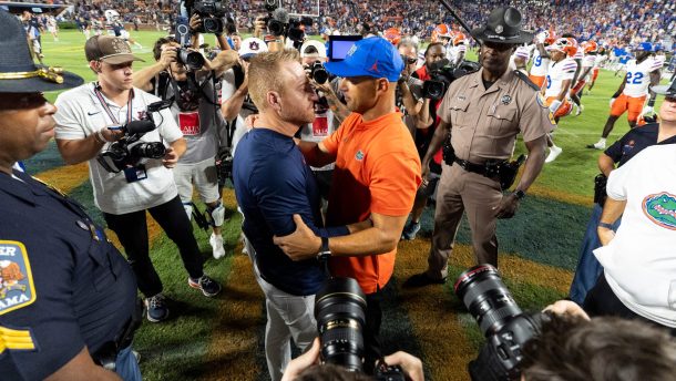 Jon Sumrall and Alex Golesh's postgame handshake.