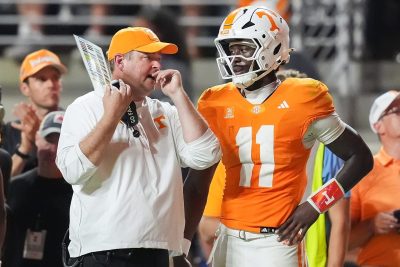 Tennessee QB Faizon Brandon and coach Josh Heupel.