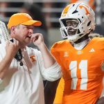 Tennessee QB Faizon Brandon and coach Josh Heupel.