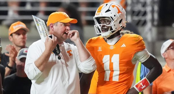 Tennessee QB Faizon Brandon and coach Josh Heupel.
