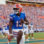 Florida RB Jadan Baugh strikes the Heisman pose after scoring a TD.