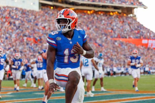Florida RB Jadan Baugh strikes the Heisman pose after scoring a TD.