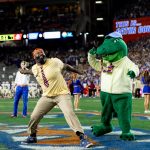 Gator great Brandon Spikes serves as Florida's honorary Mr. Two Bits.