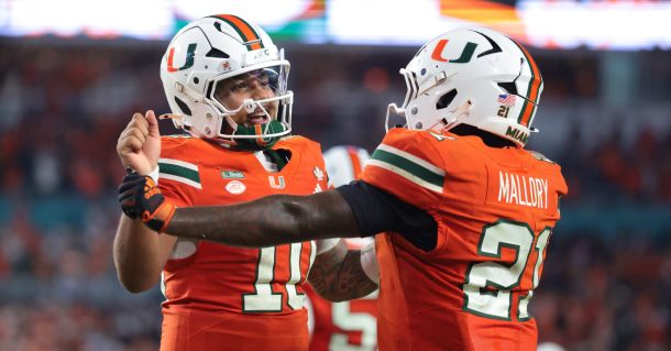 Miami players celebrate beating Florida State.
