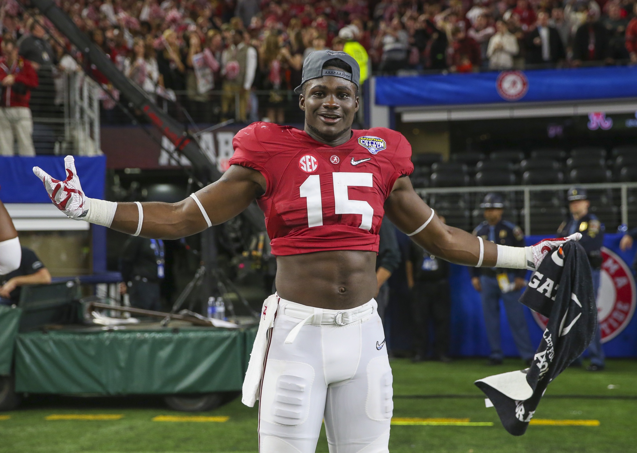 Dec 31, 2015; Arlington, TX, USA; Alabama Crimson Tide defensive back Ronnie Harrison (15) celebrates after the victory against the Michigan State Spartans in the 2015 CFP semifinal at the Cotton Bowl at AT&T Stadium. Mandatory Credit: Kevin Jairaj-USA TODAY Sports