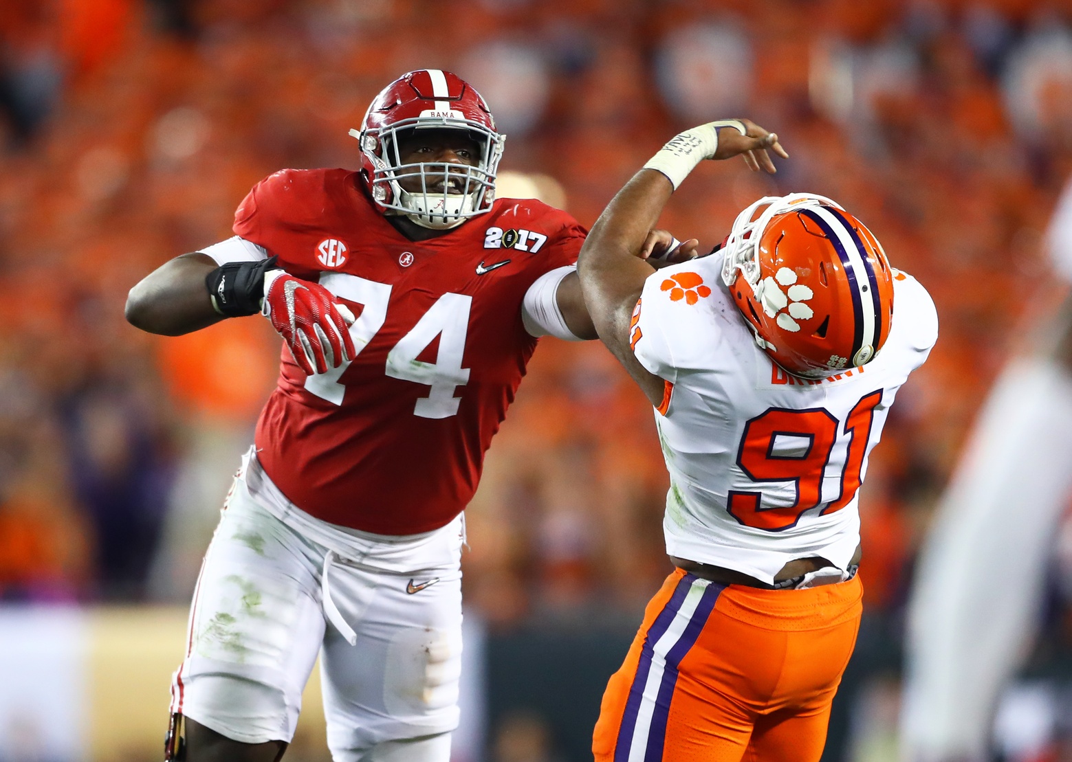 Jan 9, 2017; Tampa, FL, USA; Alabama Crimson Tide offensive lineman Cam Robinson (74) against Clemson Tigers defensive end Austin Bryant (91) in the 2017 College Football Playoff National Championship Game at Raymond James Stadium. Mandatory Credit: Mark J. Rebilas-USA TODAY Sports