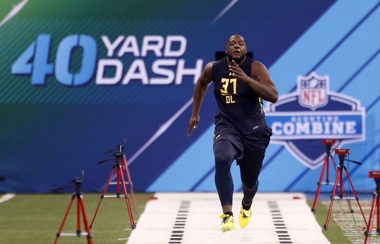 Mar 3, 2017; Indianapolis, IN, USA; Alabama Crimson Tide offensive lineman Cam Robinson (37) runs the 40 yard dash during the 2017 NFL Combine at Lucas Oil Stadium. Mandatory Credit: Brian Spurlock-USA TODAY Sports