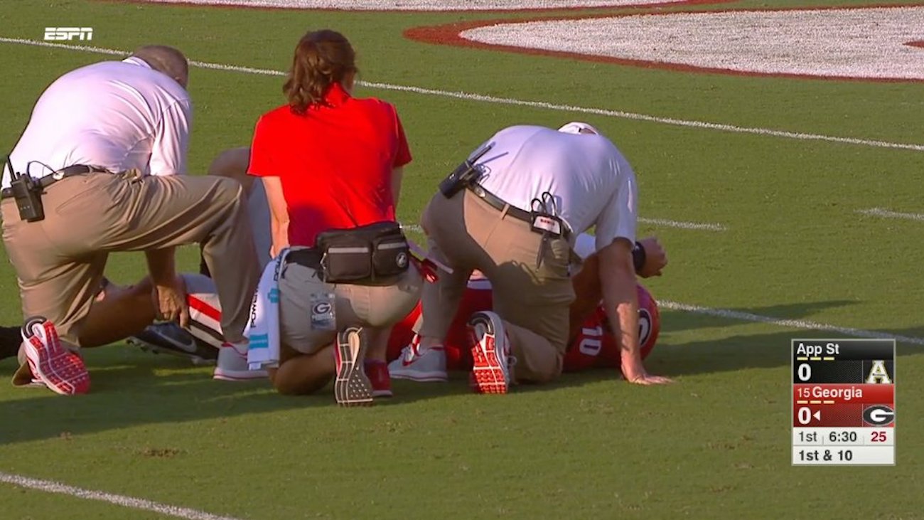 WATCH UGA QB Jacob Eason injured after late hit, penalty by