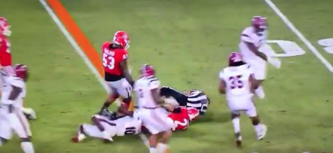 WATCH SEC defenders should take note, referee 'tackles' Nick Chubb