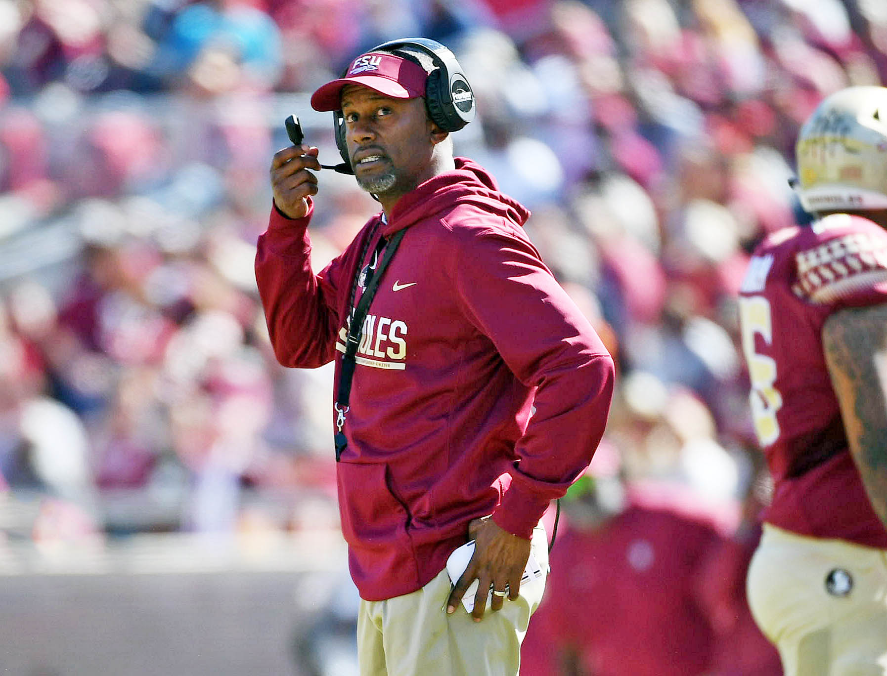 Florida State defends Willie Taggart after racist social media post attacki...