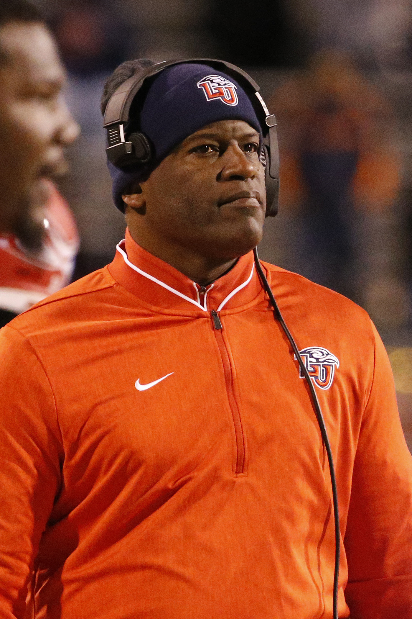 Liberty coach Turner Gill announces retirement from football