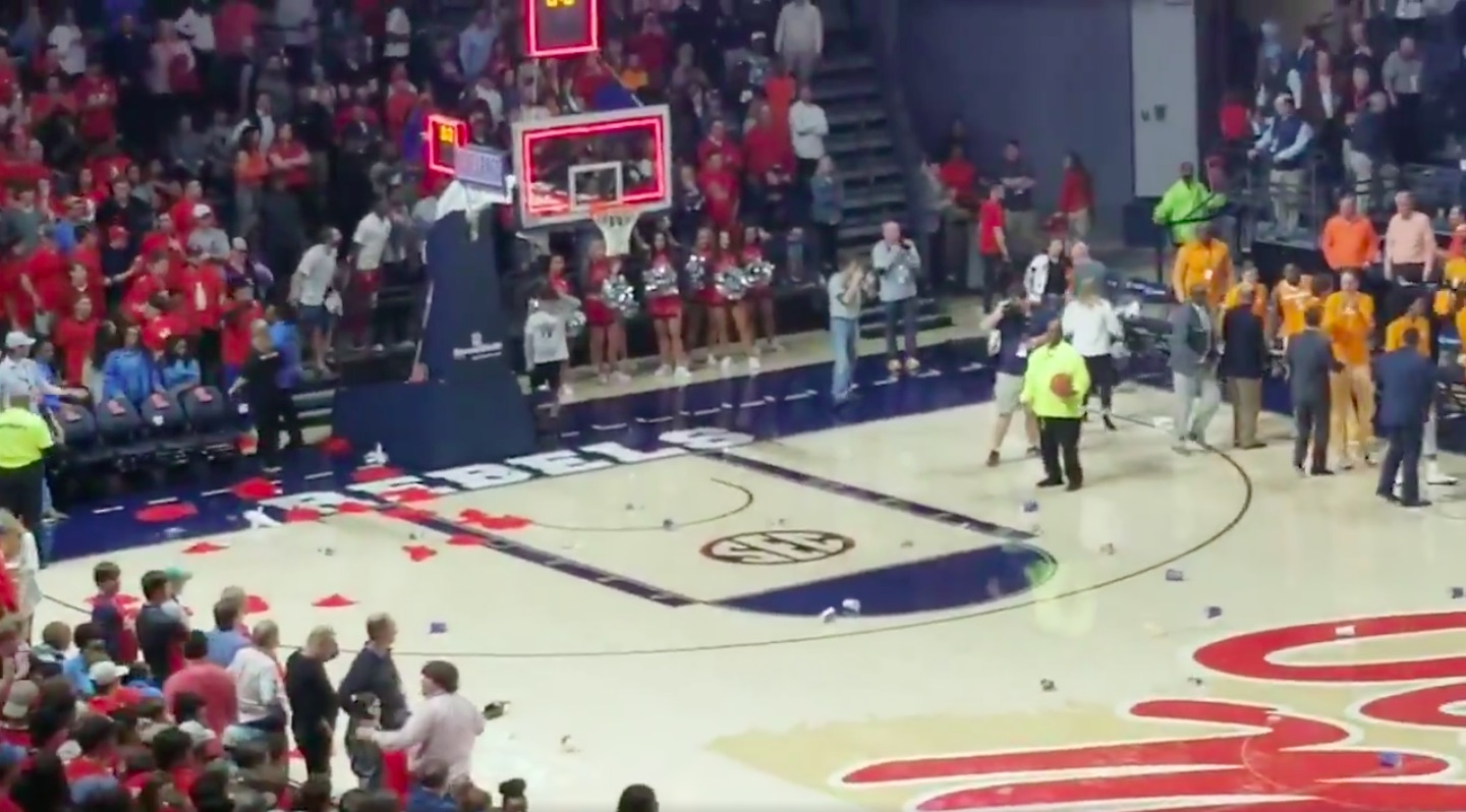WATCH Ole Miss fans throw trash on court after controversial loss to