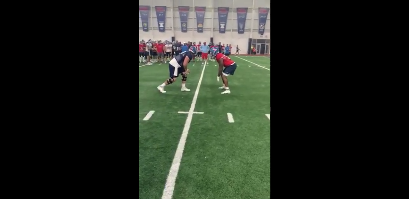 Players coach Lane Kiffin splitting lineman out wide, him catching a