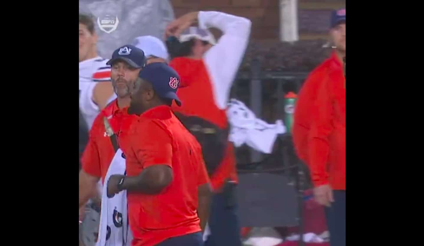 Auburn coach injures himself running down the sideline calling a timeout
